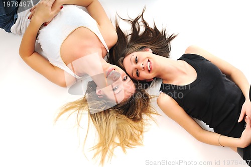 Image of two young girls isolated on white