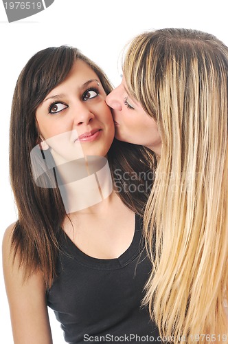 Image of two young girls isolated on white