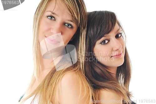 Image of two young girls isolated on white