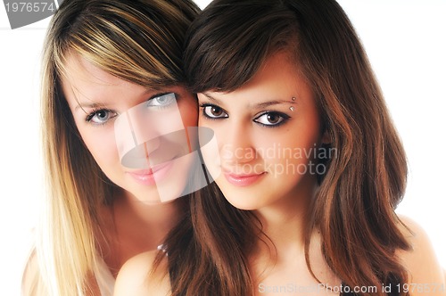 Image of two young girls isolated on white