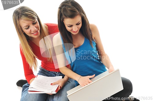 Image of two girl work on laptop