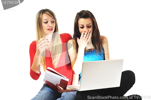 Image of two girl work on laptop