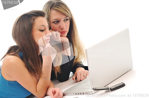 Image of two girl work on laptop