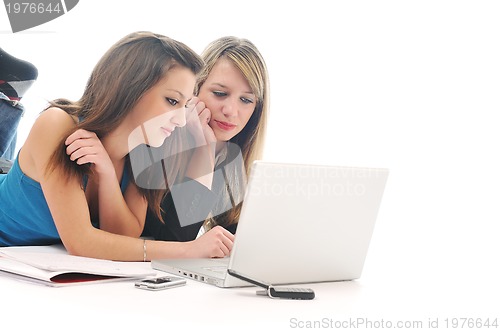 Image of two girl work on laptop