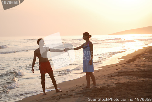 Image of romantic couple on beach