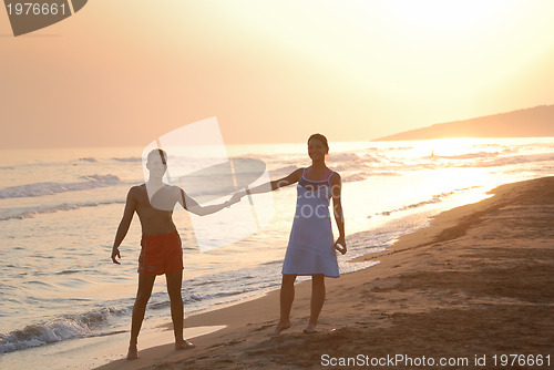 Image of romantic couple on beach