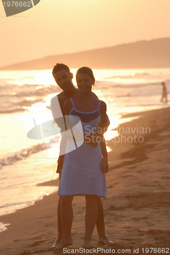 Image of romantic couple on beach