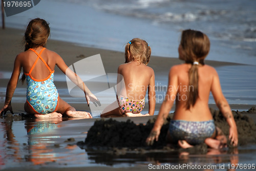Image of girls playing on beach