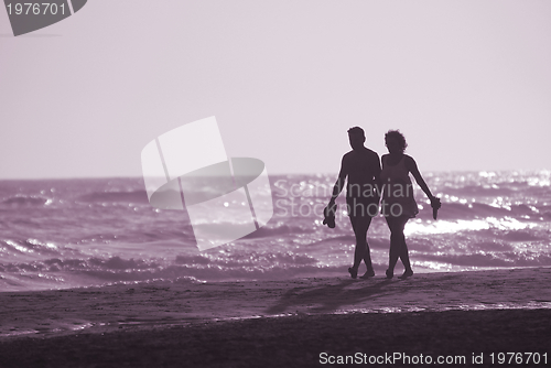 Image of romantic couple on beach