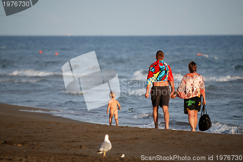 Image of young family on vacation