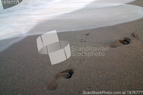 Image of footprints on beach