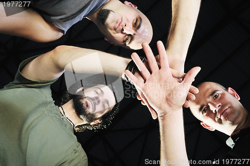 Image of three man group 