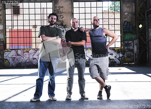 Image of three man group 