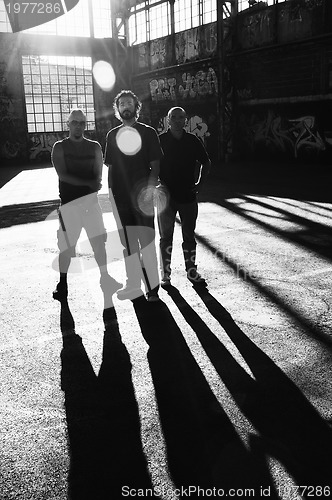 Image of three man group 