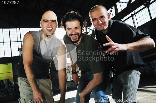 Image of three man group 