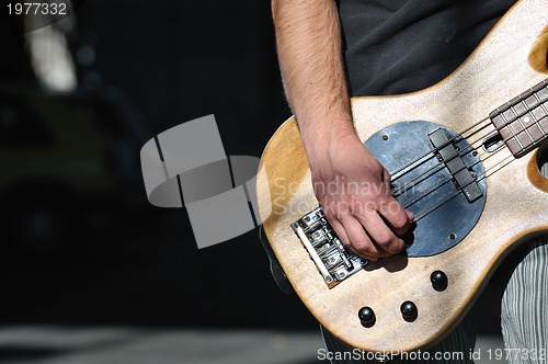 Image of music guitar player outdoor 