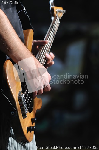 Image of music guitar player outdoor 