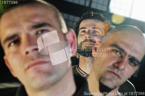 Image of three man group 