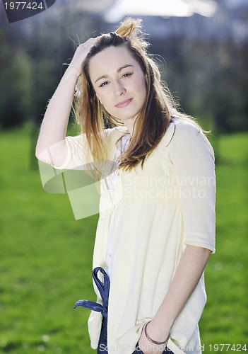 Image of young woman outdoor portrait