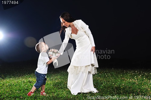 Image of bride child flower