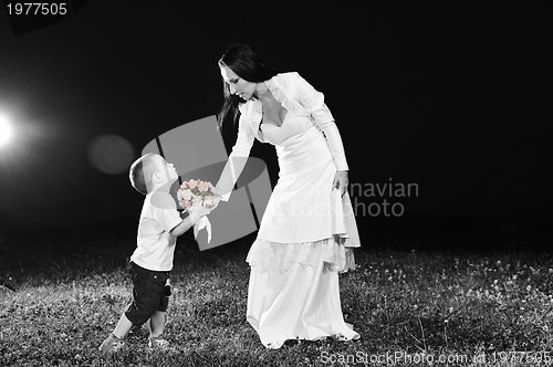 Image of bride child flower