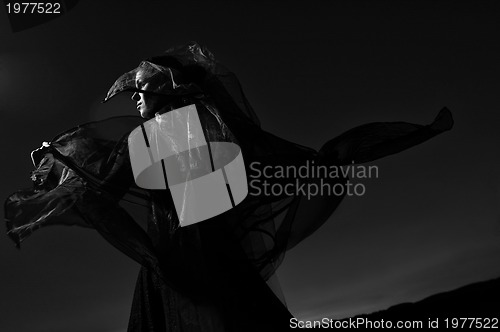 Image of bride outdoor in black weddding dress