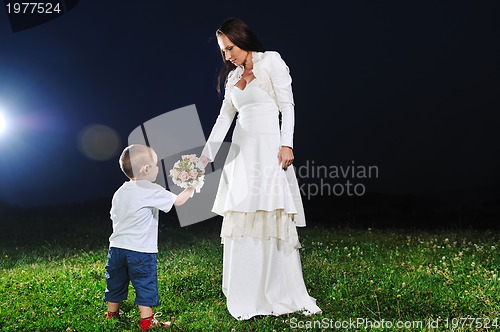 Image of bride child flower