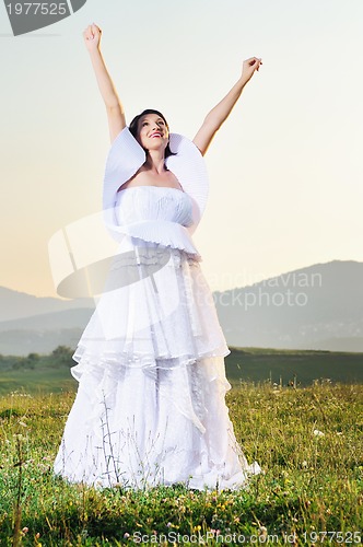 Image of beautiful bride outdoor after wedding ceremny