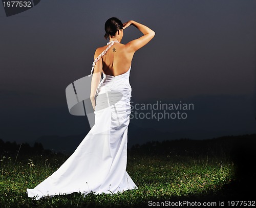 Image of beautiful bride outdoor after wedding ceremny