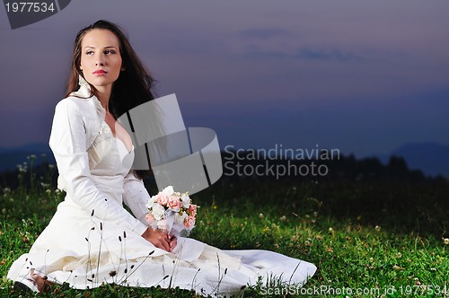 Image of beautiful bride outdoor after wedding ceremny