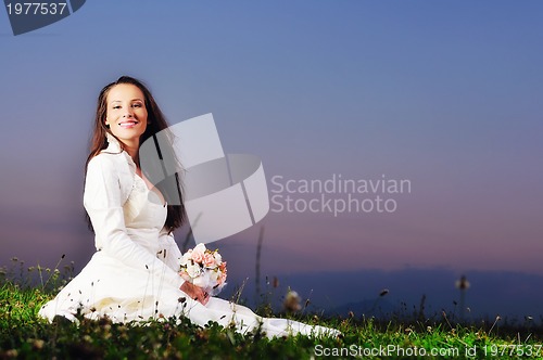 Image of beautiful bride outdoor after wedding ceremny