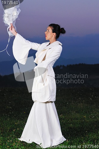 Image of beautiful bride outdoor after wedding ceremny