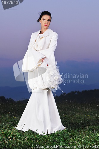 Image of beautiful bride outdoor after wedding ceremny