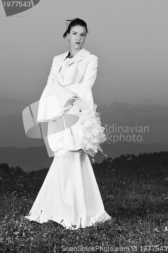 Image of beautiful bride outdoor after wedding ceremny