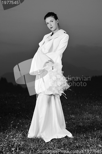 Image of beautiful bride outdoor after wedding ceremny