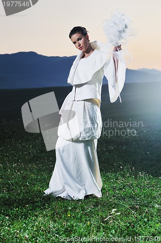 Image of beautiful bride outdoor after wedding ceremny