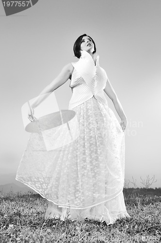 Image of beautiful bride outdoor after wedding ceremny