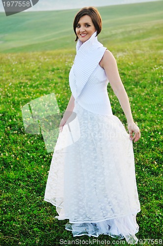 Image of beautiful bride outdoor after wedding ceremny