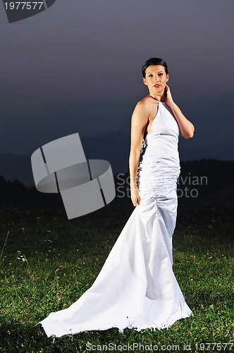 Image of beautiful bride outdoor after wedding ceremny