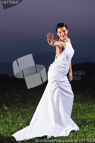 Image of beautiful bride outdoor after wedding ceremny