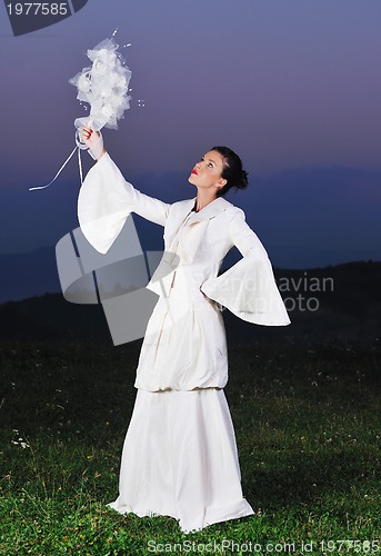 Image of beautiful bride outdoor after wedding ceremny