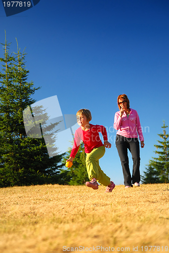 Image of mother and daughter jogging