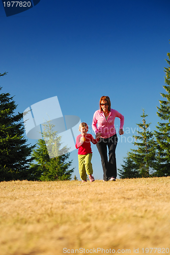 Image of mother and daughter jogging