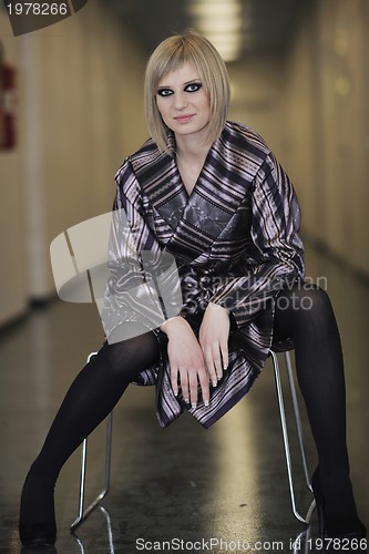 Image of portrait of beautiful young woman with nice hairstyle