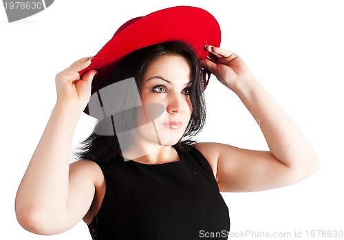 Image of young beautiful woman with red hat