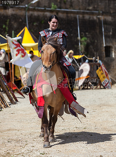 Image of Medieval Woman Riding a Horse