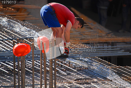 Image of busy construction worker