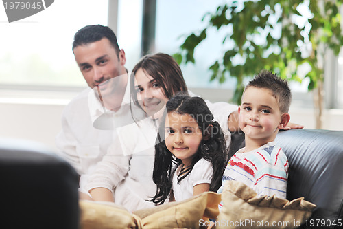 Image of young family at home