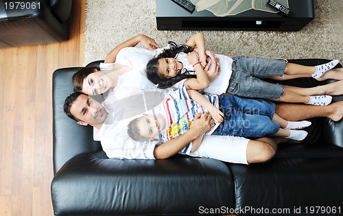 Image of young family at home