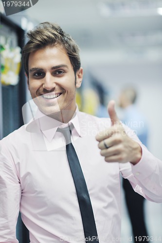 Image of it engineers in network server room